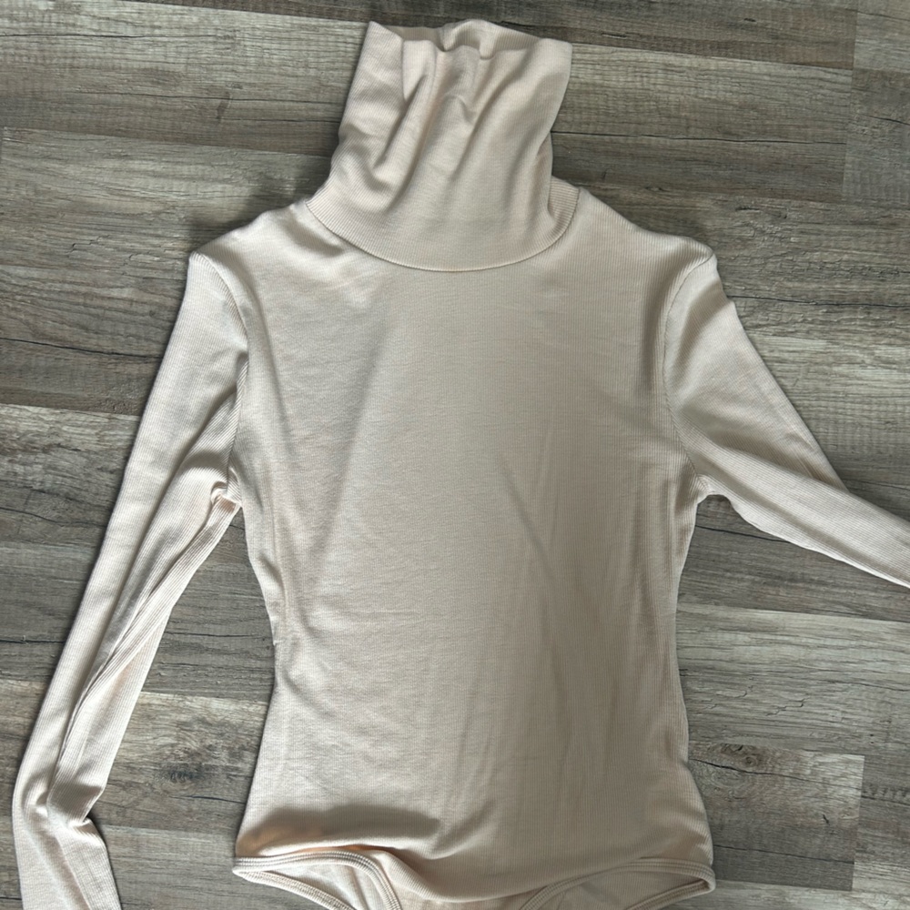 Cream turtleneck body suit